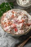 Close-Up of Refreshing Summer Salmon Salad with Creamy Dill Dressing Served in a Bowl. photo