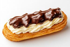 Delicious eclair topped with rich chocolate and creamy filling, perfect for desserts or sweet treats. photo