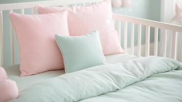 Cozy pastel bedding with soft pillows in pink and mint, perfect for creating a serene nursery or bedroom environment. photo