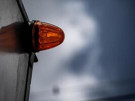 Additional turn signal mounted on the container on the transport vehicle photo