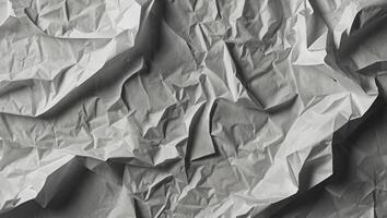 Abstract white paper wrinkled or crumpled texture background, top view, flat lay. photo