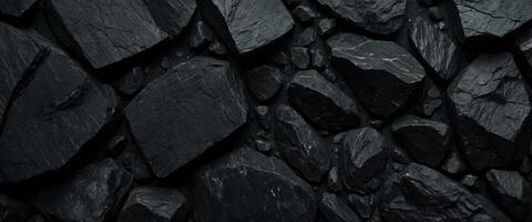 Black abstract background Dark rock texture Black stone background with copy space for design Web banner Wide. photo