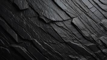 Black slate texture Uneven rough surface, height differences Top view. photo