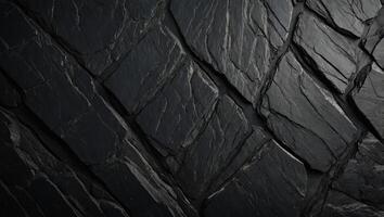 Black slate texture Uneven rough surface, height differences Top view. photo