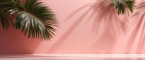 Blurred shadow from palm leaves on the pink wall Minimal abstract background for product presentation Spring and summer. photo