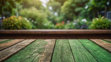 Empty wood table top on blur abstract green from garden and house background For montage product display. photo