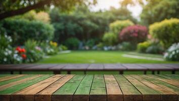 Empty wood table top on blur abstract green from garden and house background For montage product display. photo