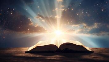 Opened bible in the sky with rays of light coming from above. photo