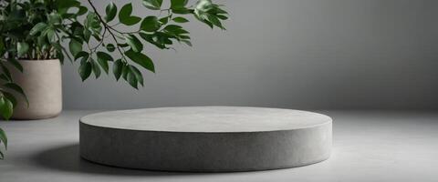 Top view of an empty round podium with green leaves on a light grey background, ideal for eco product presentations. photo