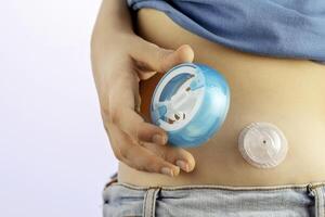 The child installs an injection port for himself photo