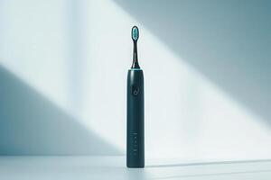 A modern electric toothbrush sits upright in gentle light, showcasing its sleek design and innovative features in a serene environment. photo