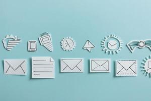 A collection of unique CRM icons and symbols arranged artistically against a solid background, showcasing communication elements and productivity tools. photo