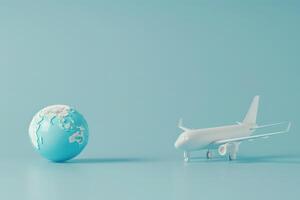 A model airplane stands next to a vibrant globe, both resting against a clean, solid background that enhances their details. photo