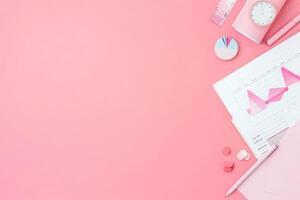 Colorful charts and data visualizations blend with stylish desk accessories, creating a vibrant workspace atmosphere. photo