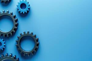 Various gears in black and blue arranged artistically against a solid blue backdrop, representing the concept of automation. photo
