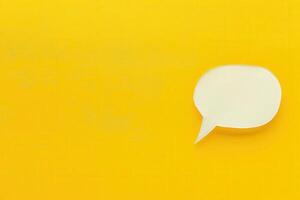A customer support chat window appears on a vibrant yellow background, inviting interaction and assistance. photo