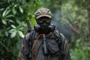A technician dressed in protective gear readies equipment for eco-friendly pest control amidst vibrant greenery. photo