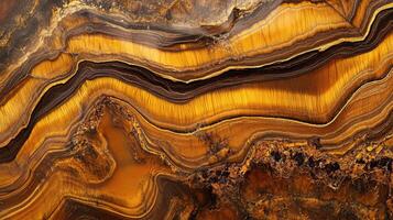 Polished tiger's eye close-up with golden brown swirling layers photo