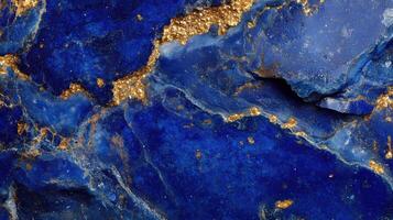 Macro shot of lazurite highlighting its bold blue and sparkling gold inclusions. photo