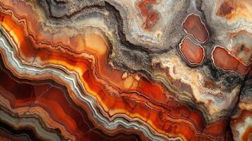 Detailed view of jasper gemstone, showcasing its rich layers of red, orange, and earthy tones. photo