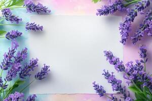 White Paper Surrounded by Lavender Blooms on a Pastel Background photo