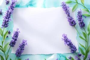 Lavender Flowers and a White Paper Note on a Teal Background photo