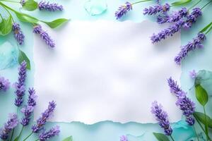 Lavender Flowers Arranged Around Blank Paper photo