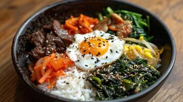 Korean Beef Bibimbap with Fried Egg and Sesame Seeds photo