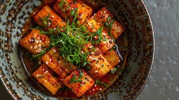 Spicy Kimchi with Sesame Seeds and Green Onions in a Bowl photo