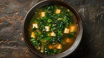 Bowl of Miso Soup with Tofu and Green Onions photo