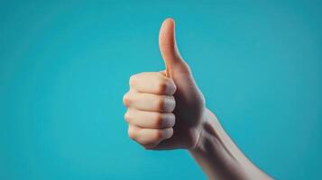 Close-up of a hand giving a thumbs up gesture photo
