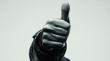 Close-up of a Hand Giving a Thumbs-Up Gesture photo