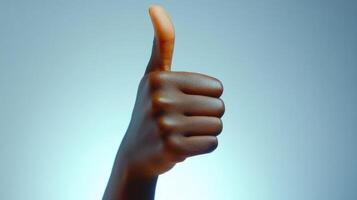 Close-up of a person's hand giving a thumbs up gesture photo