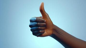 A Hand Giving a Thumbs Up Gesture photo