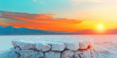 Salt Flats Platform at Sunset with Mountain Range in the Distance photo