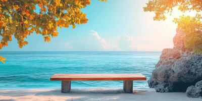 Wooden Bench on a Sandy Beach with Turquoise Ocean and Rocks photo