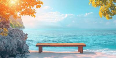 Wooden Bench on a Sandy Beach With Clear Blue Ocean and a Rocky Cliff in the Background photo