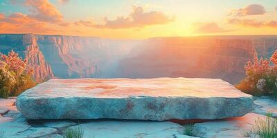 Sunset Over a Canyon with a Large Rock in the Foreground photo