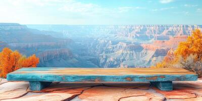 Wooden Bench Overlooking the Grand Canyon with Autumn Foliage photo