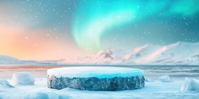 Snowy Landscape with a Frozen Rock Platform and an Aurora Borealis photo