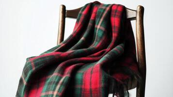 Cozy plaid blanket draped over a wooden chair against a simple background photo