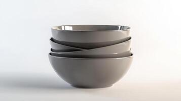 Stack of four modern gray ceramic bowls arranged artistically on a light background photo