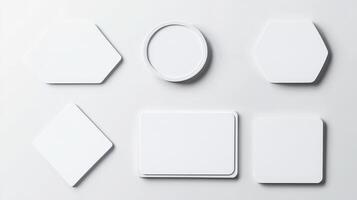Collection of various blank shapes on a light surface showcasing design elements for creative projects photo