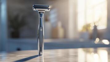 A close-up view of a modern razor on a marble countertop in a bright bathroom during the early morning light photo