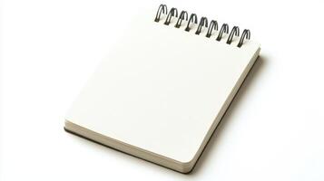 Blank spiral notebook resting on a flat surface, ready for notes, sketches, or creative writing photo