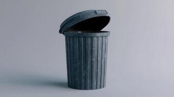 A simple gray trash can with an open lid, set against a neutral background in a clean, well-lit environment photo
