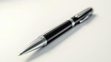 A close-up of a sleek black pen resting on a smooth white surface in a well-lit office setting photo