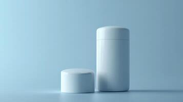 Minimalist white containers on a soft blue background showcasing modern design and aesthetic appeal in a studio setting photo