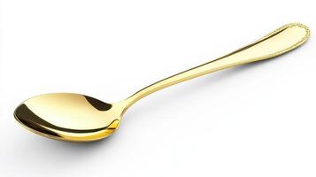 A shiny golden spoon resting on a white surface, showcasing its elegant design and reflective surface, ideal for dining or display purposes photo