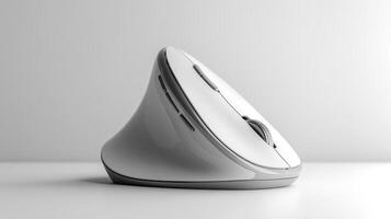 Modern ergonomic mouse positioned on a minimalist background for a sleek workspace setup photo
